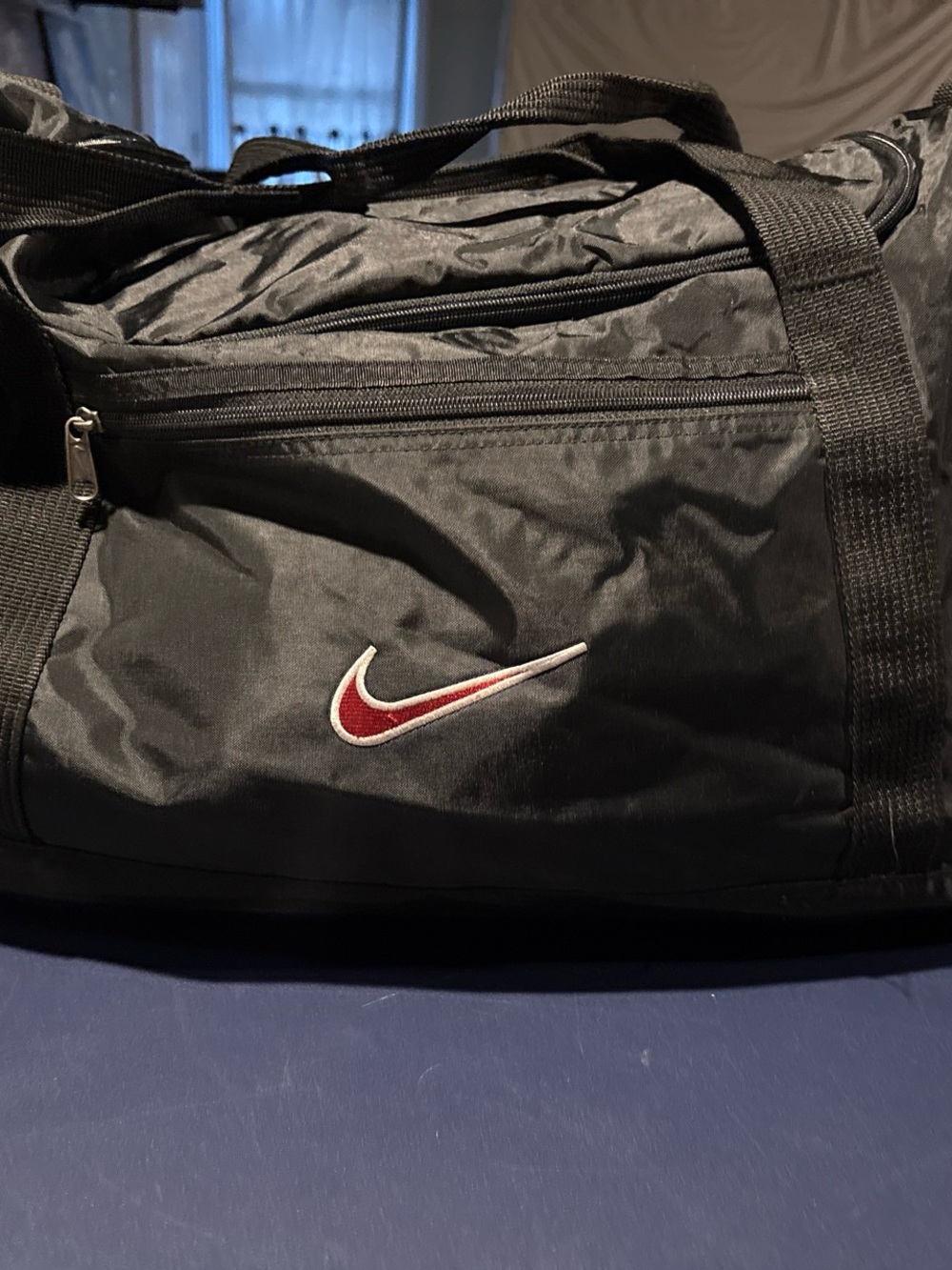 Nike Black Duffel with Red and White Swoosh Accent